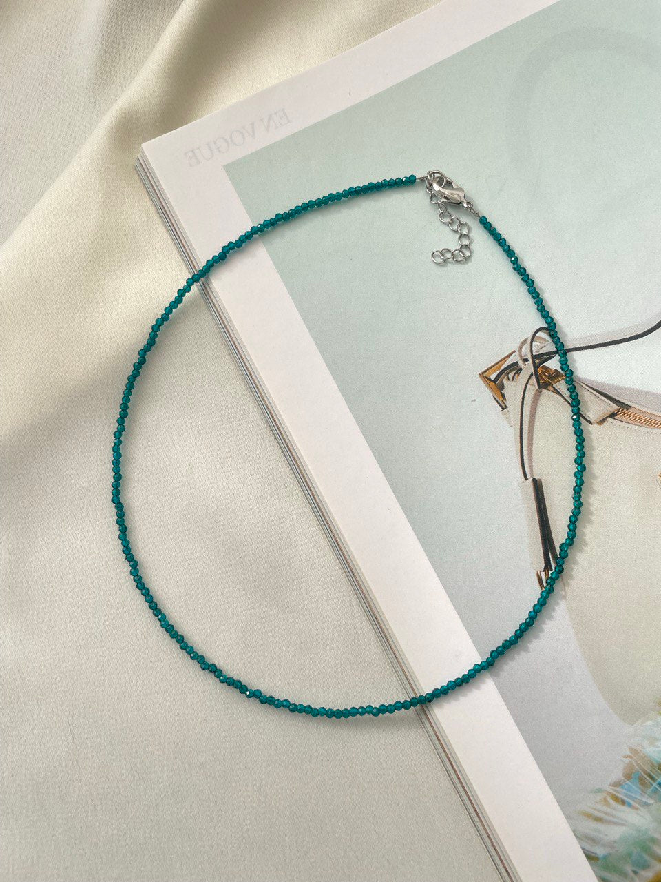 Thin necklace made of colored spinel