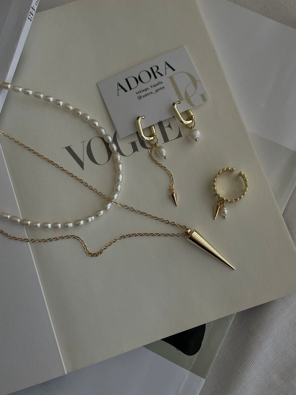 Серьги - овалы с жемчугом