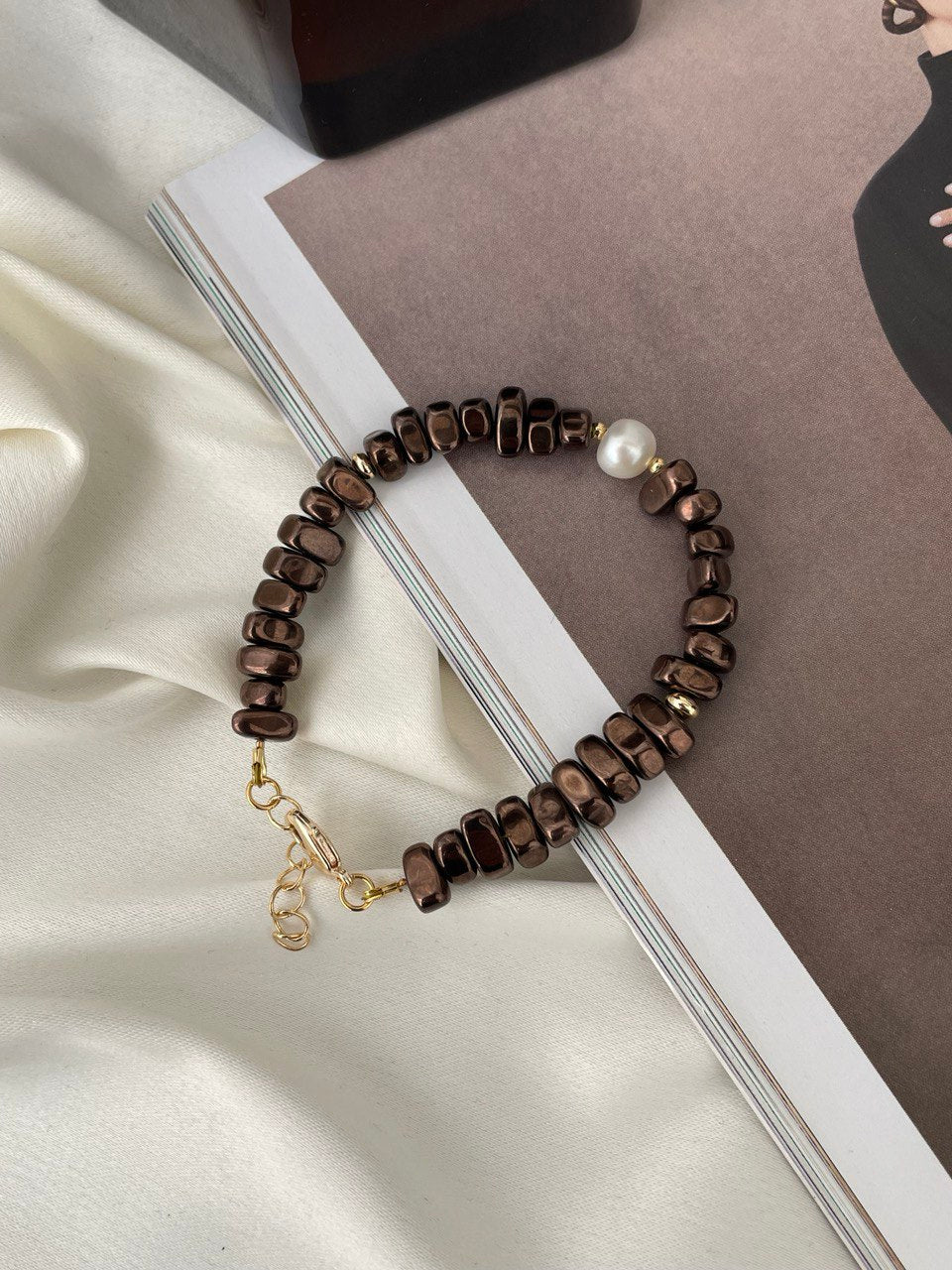 Pulsera de hematita con perla