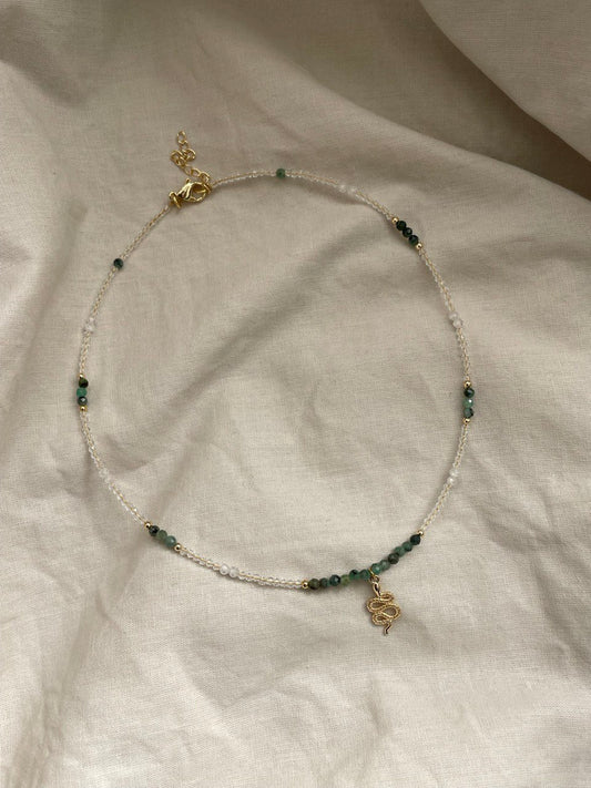 Necklace with emerald and cubic zirconia